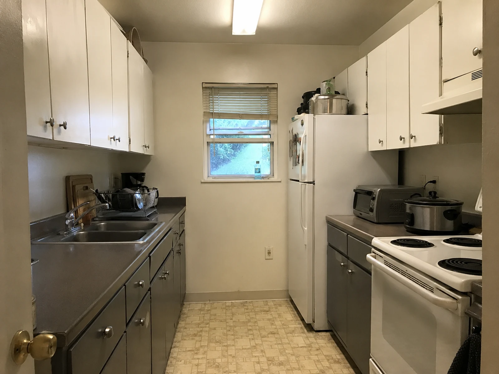 Small galley kitchen before AI kitchen design lighting and layout option