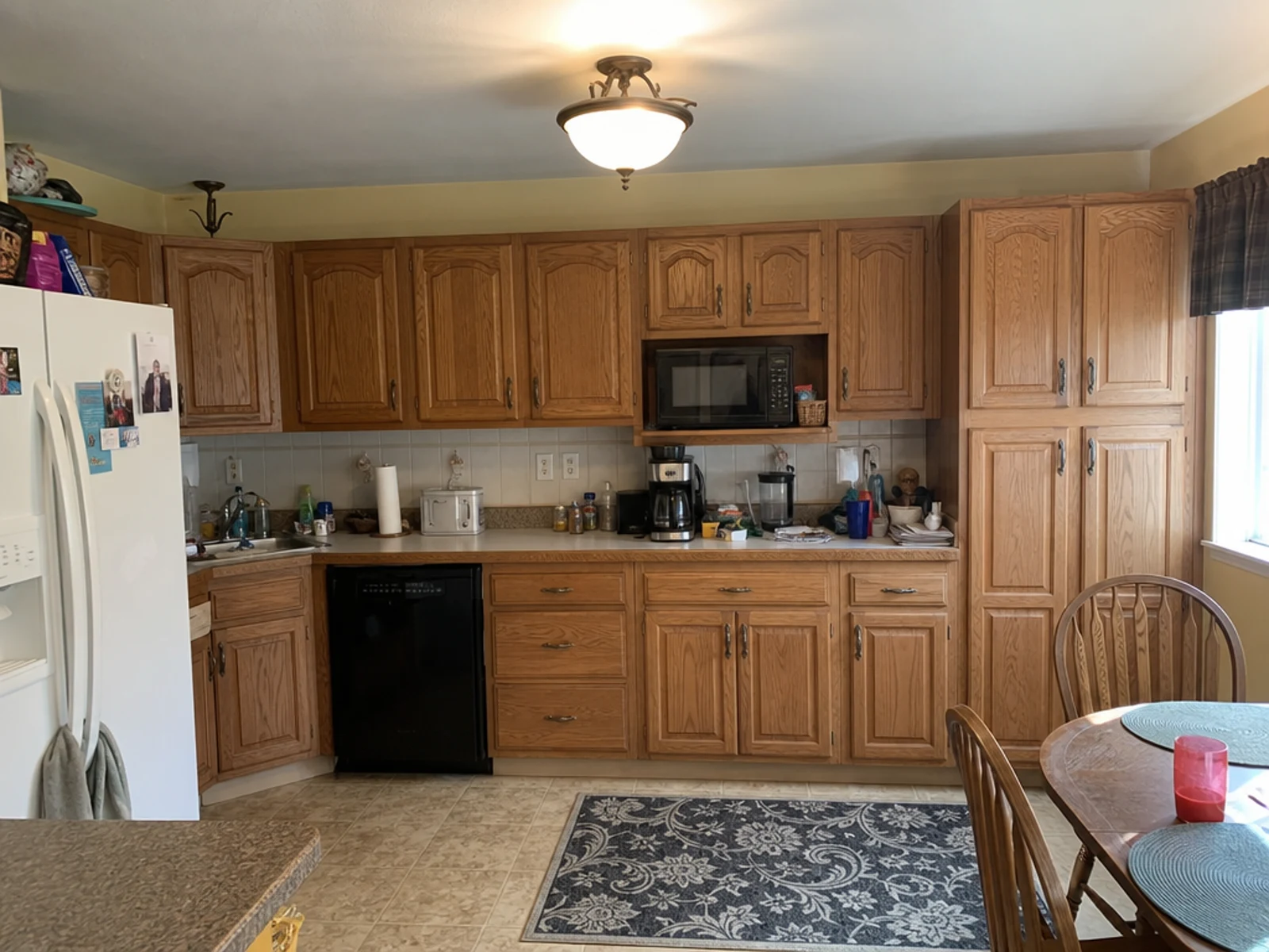 Existing kitchen before AI storage and pantry wall design option