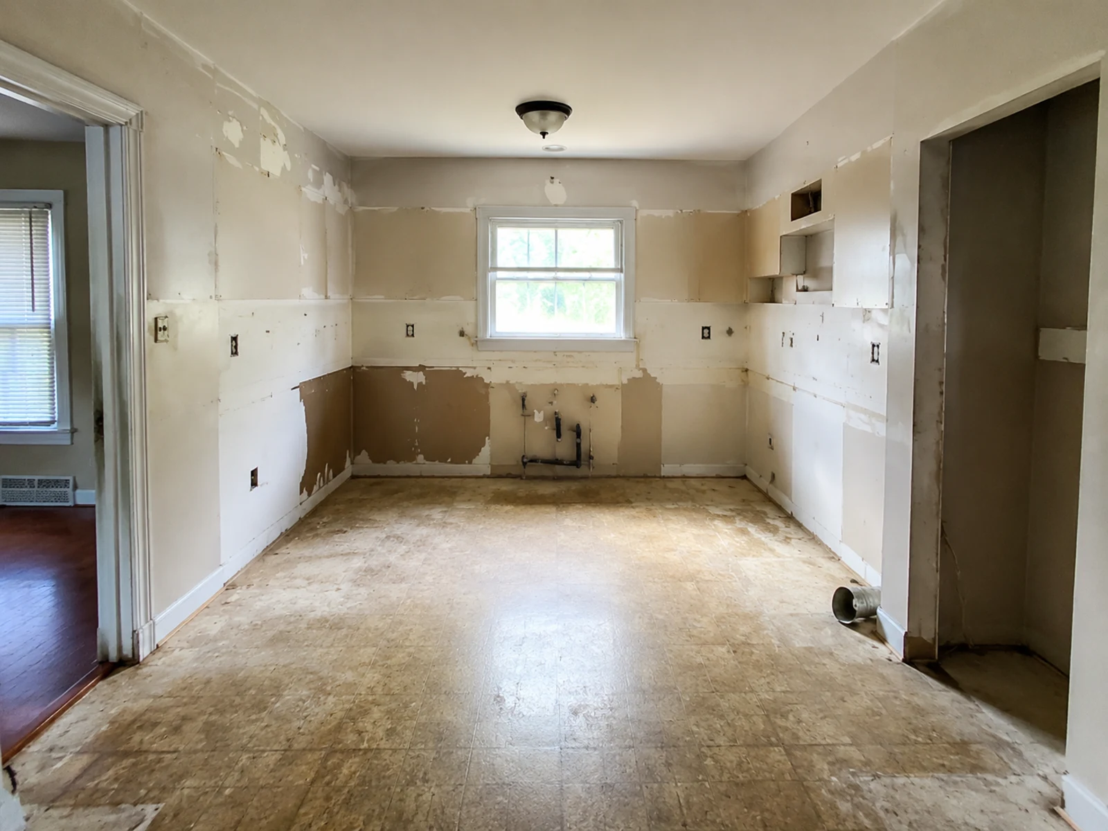 Unfinished empty kitchen before AI kitchen remodel concept