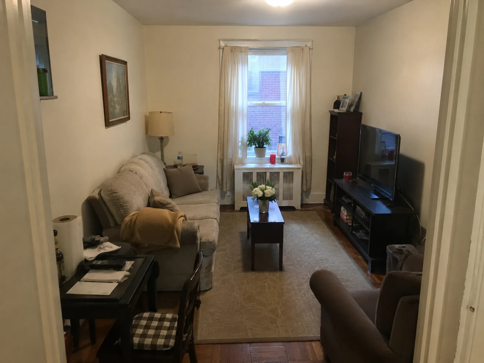 Small living room before AI storage and lighting design option