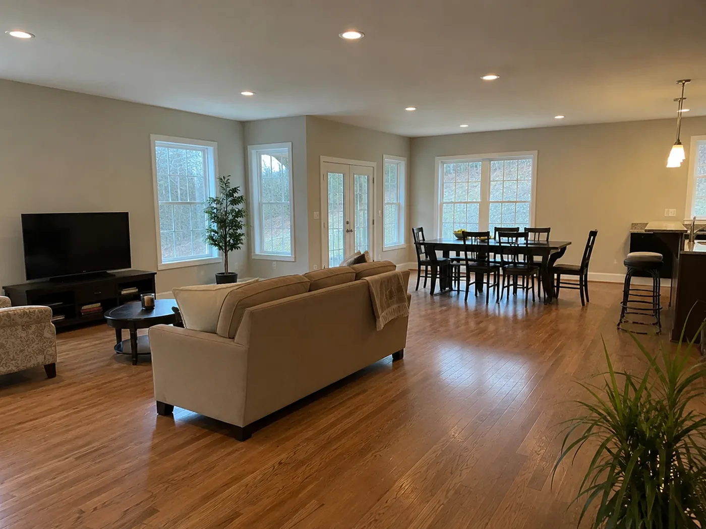 Open-plan living area before AI zoning and seating concept